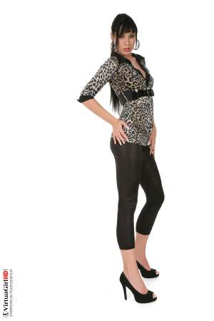 Stripper Picture of Alyssia - Her high heel waving in the air as her sweet shaved pussy is exposed for your eyes only! Alyssia is a vixen daring to let you drink in her intimate beauty as her slender pink vibrator and long masterful fingers flutter across her clit and bring out the best of her beautiful orgasms!