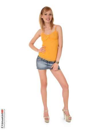 Stripper Picture of Nikita - Nikita bursts off your screen like a celestial star going supernova in her raspberry negligee! A delight for your eyes as she whirls around and the hem of her mini-gown dances along the upper edge of her perfect ass. So much energy and passion in such a small package. She is a star that burns as bright as any in the midnight sky!