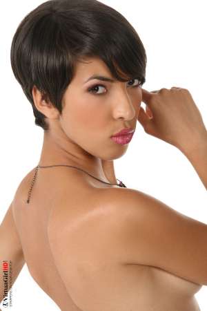 Stripper Picture of Jasmine Arabia - Ya Habibi means 'my love one' and is the most common term of endearment in Morocco. It comes in handy any time you see Jasmine Arabia and it's fun to say. Call her in her own native tongue to catch her attention and let her belly-dance her way toward you for the start of a romantic interlude that will have you wanting to stay in her homeland forever!