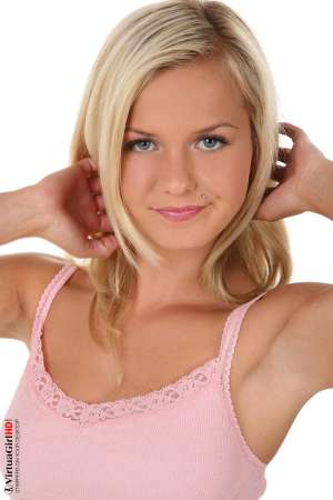 Stripper Picture of Bella - The shy innocence of 22 year old Bella really comes out in her Sweet Kisses show. Some girls seem like amateurs even after hundreds of hours of professional training and Bella is one of them. She appears so casual and relaxed even though each move is carefully planned and perfectly in sync with your libido!