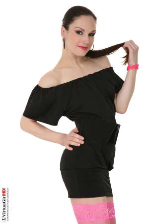 Stripper Picture of Anna - Those pretty pink nylons are only thigh-high on Anna and in a room as cold as our erotica studio that's important. She's got nothing to warm her above that panty line since she's completely shaved and that drafty breeze that meanders through the room was enough to keep her sexual urges climbing with every step of this titillating performance!