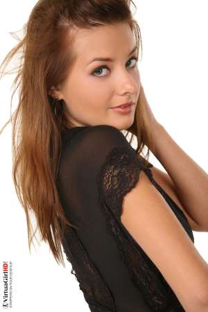 Stripper Picture of Anna Tatu - Some girls prefer long dresses others opt for short mini-skirts then there are sexy sweethearts like Anna Tatu who shrink their hemline so high that you can almost see everything any time she walks across the room. Did you see it? Just a glimpse? Waive for her to come closer and give you an even better look as you explore every inch of her beautiful body together!