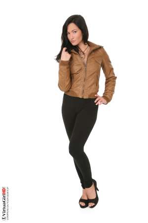 Stripper Picture of Tess Lyndon - Tess Lyndon is dancing solo for you and she's ready to send some good vibrations your way. A twenty one year old from the Czech Republic she looks amazing in her high heels and her white lace pantie set with those dark nipples peeking out at you from behind their thin veil.