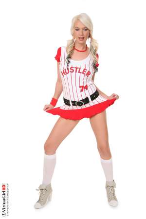 Stripper Picture of Alice Saint - There is something about tall blondes that drive men mad and one look at Alice Saint and those long legs will show you why! Mmmm....she looks so good in her pink see through nightie as her nipples get hard against the sheer material. Lucky for you she takes it all off in this super sexy show.