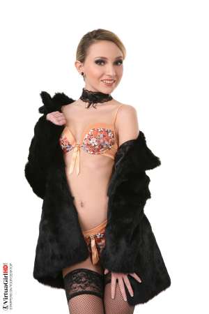 Stripper Picture of Nataly Von - Nataly Von is a petite blonde standing only 5ft 3in tall. She's got tiny breasts that are perfectly shaped and topped off with cute little nipples that can stay erect for hours. Nataly shaves herself naked and enjoys being smooth and sexy for her fans. When she performs Nataly gets so into the music that she often loses track of time and can dance the night away.