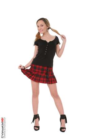 Stripper Picture of Nataly Von - Nataly Von is a petite blonde standing only 5ft 3in tall. She's got tiny breasts that are perfectly shaped and topped off with cute little nipples that can stay erect for hours. Nataly shaves herself naked and enjoys being smooth and sexy for her fans. When she performs Nataly gets so into the music that she often loses track of time and can dance the night away.