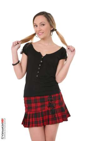 Stripper Picture of Nataly Von - Nataly Von is a petite blonde standing only 5ft 3in tall. She's got tiny breasts that are perfectly shaped and topped off with cute little nipples that can stay erect for hours. Nataly shaves herself naked and enjoys being smooth and sexy for her fans. When she performs Nataly gets so into the music that she often loses track of time and can dance the night away.