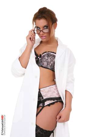 Stripper Picture of Bettina Di Capri - Bettina Di Capri is twenty years old and enjoys keeping her body in tip top shape through cross fit exercising. Her physique is very important to her because being in shape makes her feel the most sexy. In addition to an active lifestyle Bettina enjoys wearing high heels that show off her sculpted legs and short skirts that highlight her apple bottom.