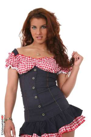 Stripper Picture of Bettina Di Capri - Bettina Di Capri is twenty years old and enjoys keeping her body in tip top shape through cross fit exercising. Her physique is very important to her because being in shape makes her feel the most sexy. In addition to an active lifestyle Bettina enjoys wearing high heels that show off her sculpted legs and short skirts that highlight her apple bottom.