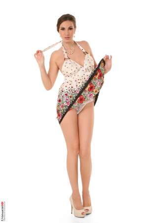 Stripper Picture of Conny - Conny is 24 years old and from the Czech Republic. She is an accomplished hair stylist and dreams of owning her own salon some day. She started her erotic dancer career as a means to an end to get her business off the ground but found she fell in love with the attention and adulation of her fans. Now Conny says she will dance for as long as her fans still want to see her perform! Conny feels sexiest in short skirts and heels and loves to shop for vintage accessories and bracelets.