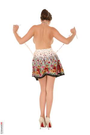 Stripper Picture of Conny - Conny is 24 years old and from the Czech Republic. She is an accomplished hair stylist and dreams of owning her own salon some day. She started her erotic dancer career as a means to an end to get her business off the ground but found she fell in love with the attention and adulation of her fans. Now Conny says she will dance for as long as her fans still want to see her perform! Conny feels sexiest in short skirts and heels and loves to shop for vintage accessories and bracelets.