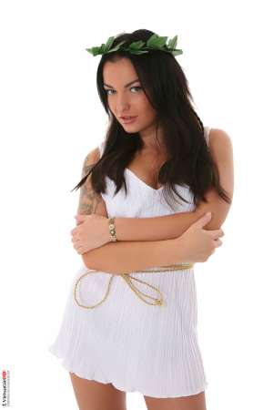 Stripper Picture of Star - Star is one of our newest Diva's and we are sure you are going to want to get to know her every curve! Star is from the United Kingdom and says soccer runs through her veins. She was into the punk and goth scene back in the UK and is very proud of her tattoos. She loves to go out on blind dates and act like a demure princess then get the guys home to show them her total wild side! Star has a huge collection of high heeled shoes and she says she swears by Brazilian waxing! Hard wood floors for her forever!