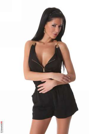 Stripper Picture of Ella Mai - Ella Mai prides herself on her amazing body. She is long and lean and has always wanted to be a fashion model. She got her first big break as a lingerie model and the erotic thrill she got from being practically naked in front of the photographers made her realize her exhibitionist nature. Wanting more of that energy Ella combined her love of dance with her exhibitionist sex.