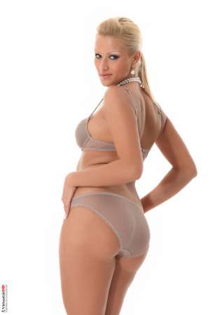 Stripper Picture of Cherry Kiss - Cherry Kiss is a new model we found living in Belgrade Serbia. We couldn't keep our eyes off of her long legs and full hips. Her tiny tits are also perfect additions to her very sexy body and if you haven't noticed we are huge fans of blonde beauties. Cherry is a down to earth diva that enjoys having friends over for dinner and exploring intimate jazz lounges with good music. We are sure you will like her stage performances as much as we do so please welcome Cherry Kiss to the VirtuaGirl forum!