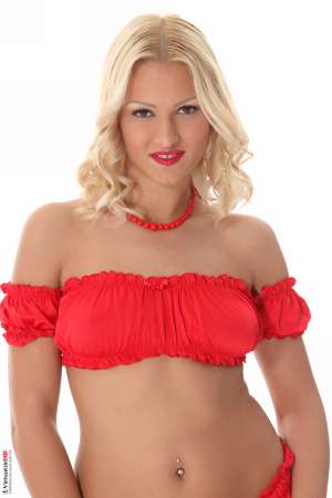 Stripper Picture of Cherry Kiss - Cherry Kiss is a new model we found living in Belgrade Serbia. We couldn't keep our eyes off of her long legs and full hips. Her tiny tits are also perfect additions to her very sexy body and if you haven't noticed we are huge fans of blonde beauties. Cherry is a down to earth diva that enjoys having friends over for dinner and exploring intimate jazz lounges with good music. We are sure you will like her stage performances as much as we do so please welcome Cherry Kiss to the VirtuaGirl forum!