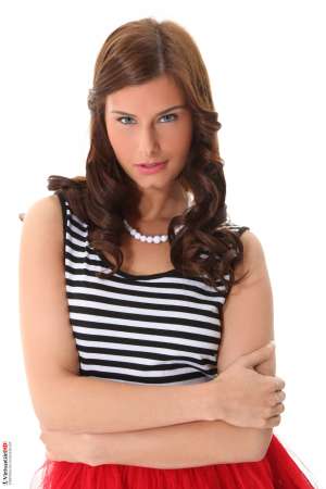 Stripper Picture of Ines - We love sexy divas with long legs and long dark hair so we had to pursue Ines and get her to dance for us. Ines loves stripping and exotic dancing. She loves the confidence and freedom getting naked on stage gives her and she can't picture doing anything else with her life for now. Ines has a retirement plan though. She wants to own her own jewelery boutique that caters to women with a bohemian style and a flare for individuality. But for now Ines would love nothing more than to give you a private show that gets you hot!