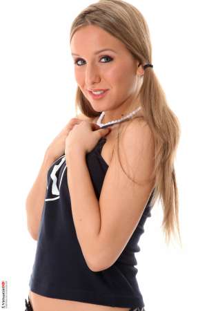 Stripper Picture of Whitney Conroy - Whitney Conroy began performing on stage to put herself through a rigorous Psychology program at a prestigious University. She is a disciplined student that always made the Deans List and she has plans to go on for her PhD someday. But Whitney has decided to take some time off from her studies to pursue her career as an exotic dancer.