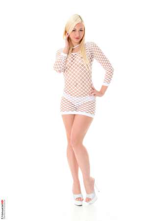 Stripper Picture of Tracy Lindsay - Tracy Lindsay is a cute little blonde from the Czech Republic. She's got an amazing personality that lights up a room and draws people in. Tracy also happens to be easy on the eyes with her taught tummy and sexy lady abs. She loves to have a good time and make her fans happy in any way she can. Her stage show is a real treat mixing sultry seduction with some of the sexiest moves you'll ever see on stage. Tracy is shaved and ready to go for you. All you have to do is download her!