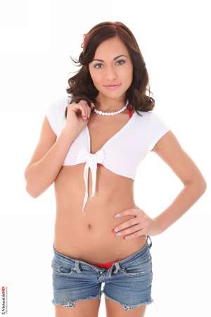 Stripper Picture of Isizzu - Isizzu is a knock out. If you haven't seen her dance before you owe it to yourself to check her out. Perfect breasts an amazing ass sculpted legs and a toned stomach all lead there way into a face with bedroom eyes and luscious kissable lips. Isizzu is sultry sexy and a dancer that will have you begging for more. She also happens to always smell delicious so breathe her in.