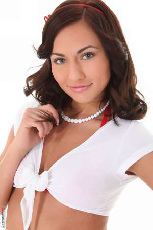 Stripper Picture of Isizzu - Isizzu is a knock out. If you haven't seen her dance before you owe it to yourself to check her out. Perfect breasts an amazing ass sculpted legs and a toned stomach all lead there way into a face with bedroom eyes and luscious kissable lips. Isizzu is sultry sexy and a dancer that will have you begging for more. She also happens to always smell delicious so breathe her in.