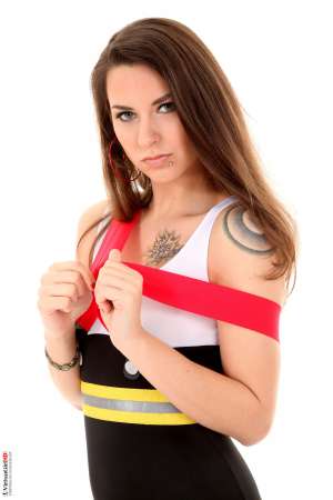 Stripper Picture of Dandelion - We are so excited to introduce you to Dandelion. She is totally hot and her stage show is guaranteed to knock your socks off. She's got an amazing body and a sexy hip tattoo that she likes to have licked. Dandelion likes to party like a rock star and she thinks tattoos on men and women are super hot. High heels are her passion and she loves to listen to music on blast with the top down on her convertible. She is a shameless flirt and she can't wait to take her clothes off for you!