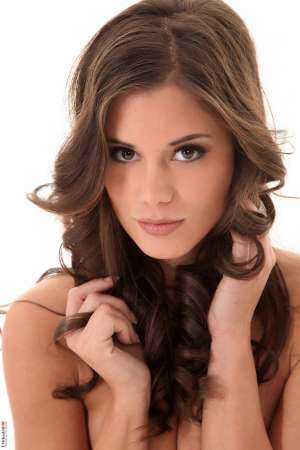 Stripper Picture of Little Caprice - We know Little Caprice is going to be a huge hit and rack up tons of fans here at Virtua Girl. She is gorgeous sexy and she knows how to move her hips. She loves exploring her sexuality and she gets so turned on knowing you are watching her strip for you in a private show. Little Caprice has perfectly perky tiny tits sexy feet long legs and eyes that will seduce you with a glance.