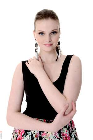 Stripper Picture of Lilly Rose - Lilly rose is a cute brunette from the Czech Republic. Lilly looks like a sweet and innocent chick but underneath it all she likes to keep her pussy shaved naked she has tattoos and body piercings and she likes to get freaky on stage for all her adoring fans. It's always the quiet types that will rock your world in bed so let Lilly do the same for you on stage!