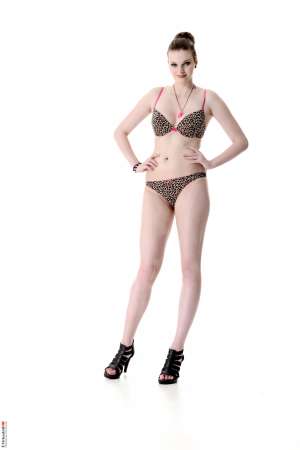 Stripper Picture of Lilly Rose - Lilly rose is a cute brunette from the Czech Republic. Lilly looks like a sweet and innocent chick but underneath it all she likes to keep her pussy shaved naked she has tattoos and body piercings and she likes to get freaky on stage for all her adoring fans. It's always the quiet types that will rock your world in bed so let Lilly do the same for you on stage!