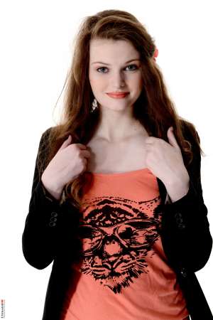 Stripper Picture of Lilly Rose - Lilly rose is a cute brunette from the Czech Republic. Lilly looks like a sweet and innocent chick but underneath it all she likes to keep her pussy shaved naked she has tattoos and body piercings and she likes to get freaky on stage for all her adoring fans. It's always the quiet types that will rock your world in bed so let Lilly do the same for you on stage!