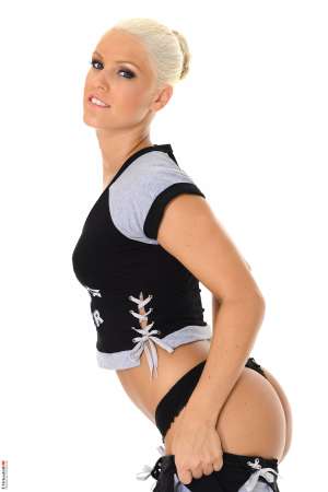 Stripper Picture of Blanche Bradburry - Blanche Bradburry is ready to burst onto the DeskBabe scene. She already has a huge legion of fans that can't get enough of her erotic stage show. Blanche is 24 years old and she hails from the Czech Republic. She loves lingerie tattoos piercings staying fit and stripping.