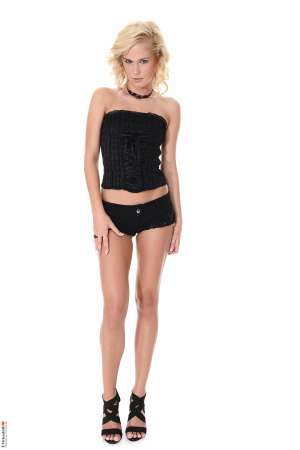 Stripper Picture of Tracy Gold - Tracy Gold came to dance for us from Budapest Hungary. This skinny sexy blonde is a real treat to watch dance her way out of her clothes to reveal her perfect naked body. With long legs and a perfect ass Tracy knows just how to shake her booty to make you want more. In her private life Tracy enjoys trail running and having athletic sex to stay in tip top shape! She loves getting bouquets of daisies over roses from her lovers and she is a huge morning sex person.