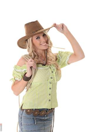 Stripper Picture of Taylor Shay - Taylor Shay is a hot blonde import from the United Kingdom. She is 27 years old and pursuing a Psychology degree at University in Human Sexuality. Taylor is as sexy as she is smart and we know you are going to love every one of her performances especially when you get a look at her big boobs. Taylor has been stripping for a number of years now and she still enjoys getting naked in front of a live audience as well as online. She always tries to answer fan mail and she tells us she loves to hear from the ladies just as much as the men!