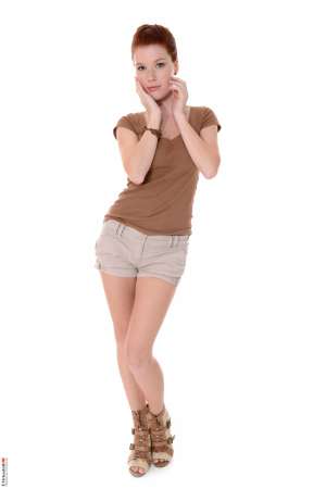 Stripper Picture of Mia Sollis - Mia Sollis is a sexy redhead that we know you are going to love. She is the kind of classy lady that makes everyone feel good when they talk with her. Mia is a self proclaimed people person and she believes it is what makes her striptease performances so special. Mia really connects with her fans and enjoys providing one on one real girlfriend experiences. So connect with Mia and download all her erotic escapades.