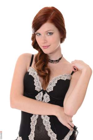 Stripper Picture of Mia Sollis - Mia Sollis is a sexy redhead that we know you are going to love. She is the kind of classy lady that makes everyone feel good when they talk with her. Mia is a self proclaimed people person and she believes it is what makes her striptease performances so special. Mia really connects with her fans and enjoys providing one on one real girlfriend experiences. So connect with Mia and download all her erotic escapades.