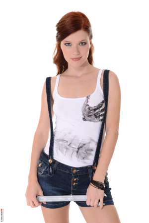 Stripper Picture of Mia Sollis - Mia Sollis is a sexy redhead that we know you are going to love. She is the kind of classy lady that makes everyone feel good when they talk with her. Mia is a self proclaimed people person and she believes it is what makes her striptease performances so special. Mia really connects with her fans and enjoys providing one on one real girlfriend experiences. So connect with Mia and download all her erotic escapades.