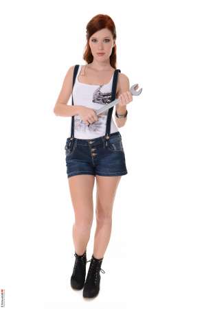 Stripper Picture of Mia Sollis - Mia Sollis is a sexy redhead that we know you are going to love. She is the kind of classy lady that makes everyone feel good when they talk with her. Mia is a self proclaimed people person and she believes it is what makes her striptease performances so special. Mia really connects with her fans and enjoys providing one on one real girlfriend experiences. So connect with Mia and download all her erotic escapades.