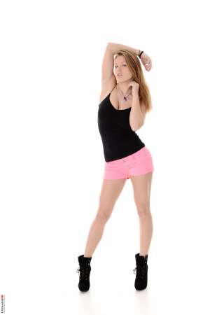 Stripper Picture of Viola - Viola comes to us from Latvia. Not only is Viola hot with big boobs but she loves high heels and having fun. Viola describes herself as a big flirt that loves to make people feel good about themselves. She thinks her legs are one of her best assets and she tells us that the smell of homemade apple pie baking away in the oven always makes her horny.