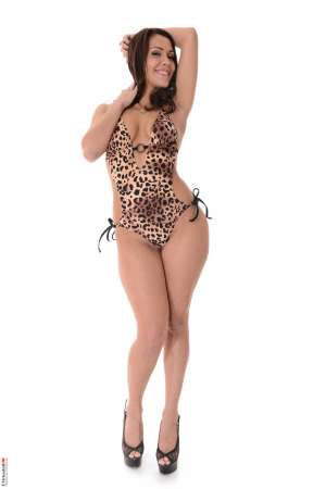 Stripper Picture of Samia Duarte - Samia Duarte is a sexy diva from Barcelona that can shimmy and shake like no other. If you appreciate the allure of a woman that can move her hips and make you want to know what she's like in bed then you need to download every one of Samia's performances. Samia believes erotic dancing is an art form and she is very proud of her skills. She says she is always incorporating new material into her numbers to keep it fresh and interesting for both her and her fans.