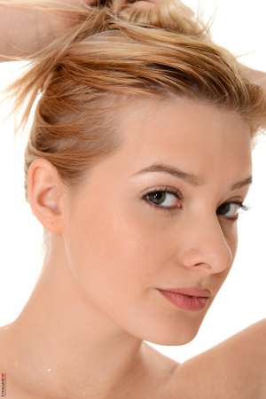 Stripper Picture of Anna Tatu - Some girls prefer long dresses others opt for short mini-skirts then there are sexy sweethearts like Anna Tatu who shrink their hemline so high that you can almost see everything any time she walks across the room. Did you see it? Just a glimpse? Waive for her to come closer and give you an even better look as you explore every inch of her beautiful body together!