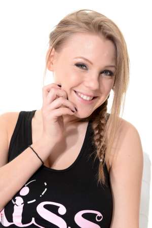 Stripper Picture of Viola - Viola comes to us from Latvia. Not only is Viola hot with big boobs but she loves high heels and having fun. Viola describes herself as a big flirt that loves to make people feel good about themselves. She thinks her legs are one of her best assets and she tells us that the smell of homemade apple pie baking away in the oven always makes her horny.