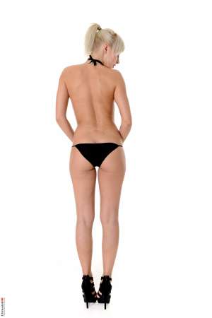 Stripper Picture of Naomi Nevena - Naomi Nevena is a relative newcomer to Desk Babes so we wanted to feature her in a few sexy solo dances. This is a great way for you to get to know Naomi as she shows you how she likes to pleasure her own body. At 22 Naomi is still exploring her sexuality and she is very excited to try new things with her hot female colleagues on camera! Keep your eyes on Naomi because we know you are going to like the show.