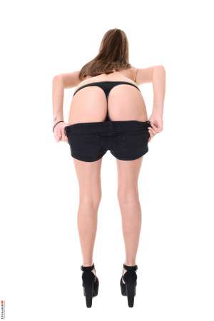 Stripper Picture of Silvie Luca - Silvie Luca is a new model that you are going to want to keep your eyes on. Silvie is the kind of woman that walks into a room and within minutes all eyes are on her. She has a sexy swagger that makes men and women take notice. Silvie is also an attention seeker so no matter what she is doing she is always putting on a show. Speaking of shows her striptease performances solo show and lesbian trysts are hot as all get out so make sure you show her some love and download her gigs.