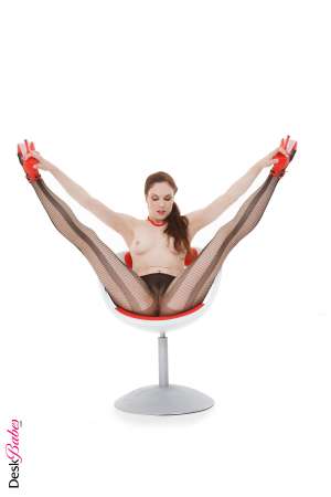 Stripper Picture of Anna - Those pretty pink nylons are only thigh-high on Anna and in a room as cold as our erotica studio that's important. She's got nothing to warm her above that panty line since she's completely shaved and that drafty breeze that meanders through the room was enough to keep her sexual urges climbing with every step of this titillating performance!