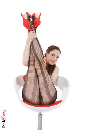 Stripper Picture of Anna - Those pretty pink nylons are only thigh-high on Anna and in a room as cold as our erotica studio that's important. She's got nothing to warm her above that panty line since she's completely shaved and that drafty breeze that meanders through the room was enough to keep her sexual urges climbing with every step of this titillating performance!