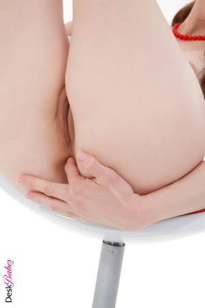 Stripper Picture of Anna - Those pretty pink nylons are only thigh-high on Anna and in a room as cold as our erotica studio that's important. She's got nothing to warm her above that panty line since she's completely shaved and that drafty breeze that meanders through the room was enough to keep her sexual urges climbing with every step of this titillating performance!