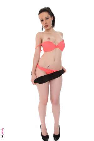 Stripper Picture of Nikita Bellucci - No you are not dreaming Nikita Bellucci is just that dreamy! Nikita is 23 years old and comes to you from Pau France. She is a goth girl at heart and has a bunch of hot tattoos to prove it. What could be more sexy than a diva goth chick with a scorpion tattoo right at her bikini line? Nikita says she loves to tease men and get them all sorts of excited and worked up so download her sexy solo scene and give her the chance to make you sweat! Nikita is a HotVideo Girl :)