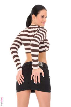 Stripper Picture of Nicole Vice - Nicole Vice is a statuesque brunette from the Czech Republic. At 23 years of age she has already made a huge name for herself by dancing at her local club. But Nicole wants to work for the best. Clearly that's why she is dancing here at DeskBabes! Get to know Nicole better by letting her strut her stuff for you.