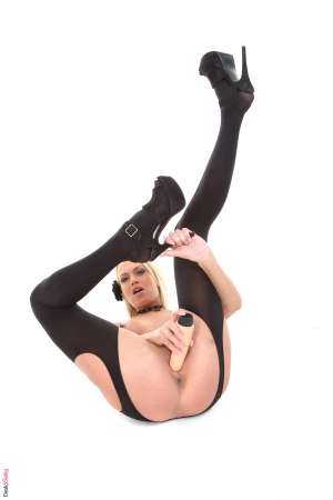 Stripper Picture of Lena Love - We know you are going to love Lena Love. Hailing from Prague this petite blonde keep her body in tip top shape! She is all lean muscle and you can see her sexy definition as she moves on stage. Lena kickboxes to stay in shape and she enjoys taking long baths by candlelight after a good workout.