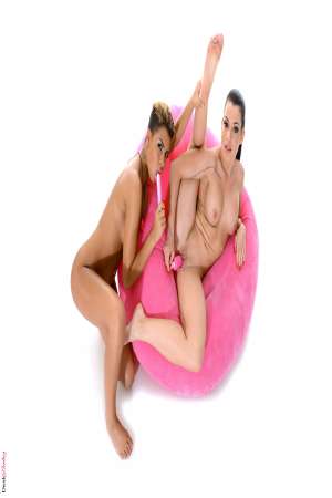 Stripper Picture of Paloma Ass & Lana Fever - Paloma Ass and Lana Fever turn up the heat as they shake their sexy frames for your viewing pleasure. They may be petite but their duo stage shows are larger than life. At just over 5' each they fit together perfectly allowing them to take one another to soaring heights of sexual ecstasy.