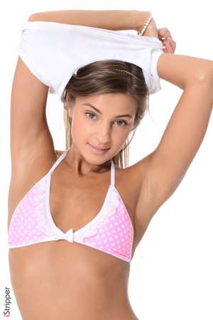 Stripper Picture of Melena Maria Rya - Melena Maria Rya is the very definition of hot! Her body is perfect and we know you are going to love watching her get naked. See the nipples on her tiny tits harden as she starts to move and look into her eyes as she takes it all off. Melena has already made a name for herself as a porn star but now she wants her fans to get to know her on a more personal level as she dances for you in private.